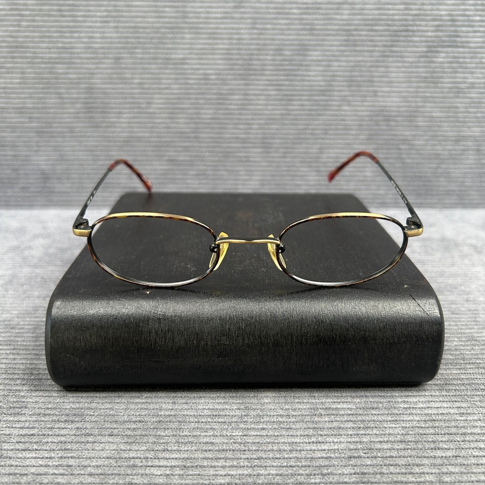 Coast 453 Antique Tortoise Oval Y2k Eyeglasses Frames 47-21-140 Black Gold Metal
